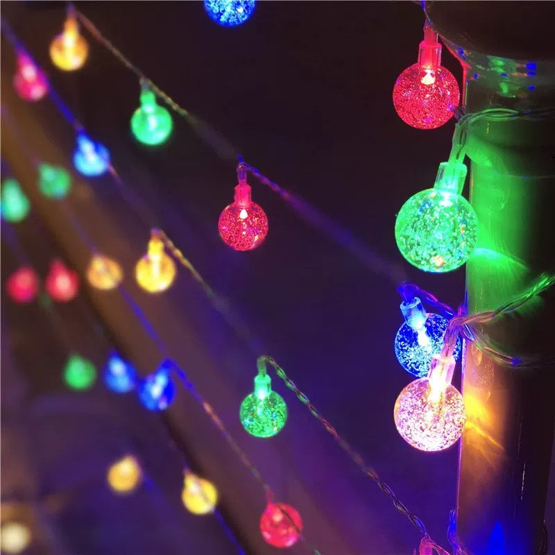 Dekorative funkelnde Globus-Lichterkette