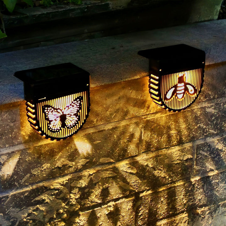 Dekorative Solar-Garten-Wandlaternen mit lasergeschnittenen Bienen- und Schmetterlingsmotiven