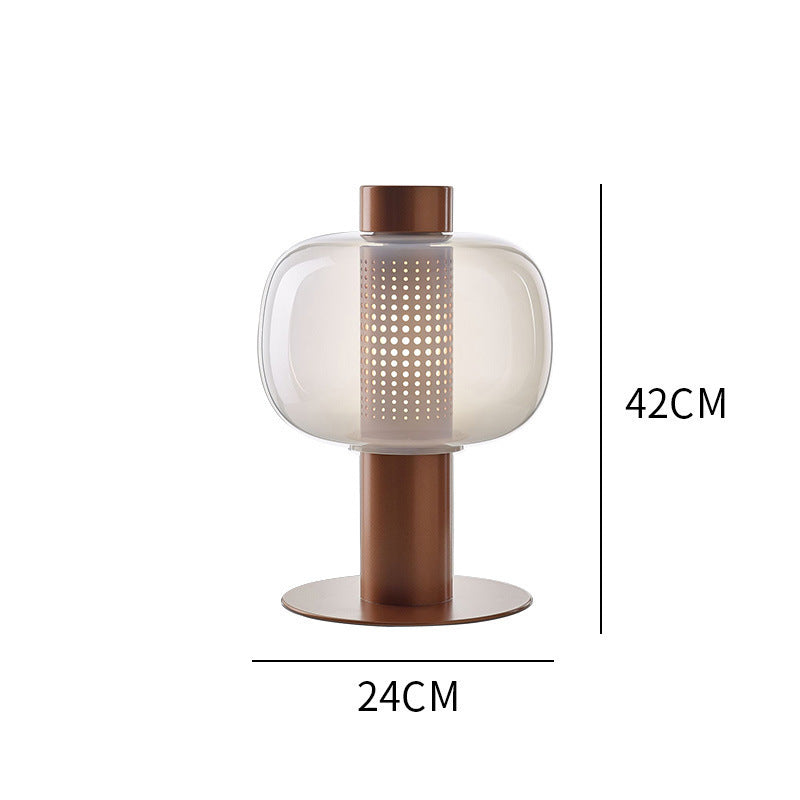 Künstlerische Tischlampe mit elegantem Glasschirm