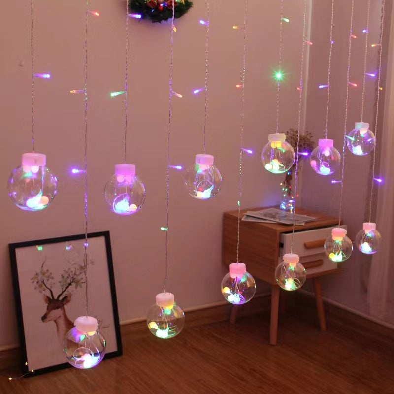 Festliche LED Vorhang Lichterkette mit hängendem Stern-Glockenbaum und Rentier-Ornamenten