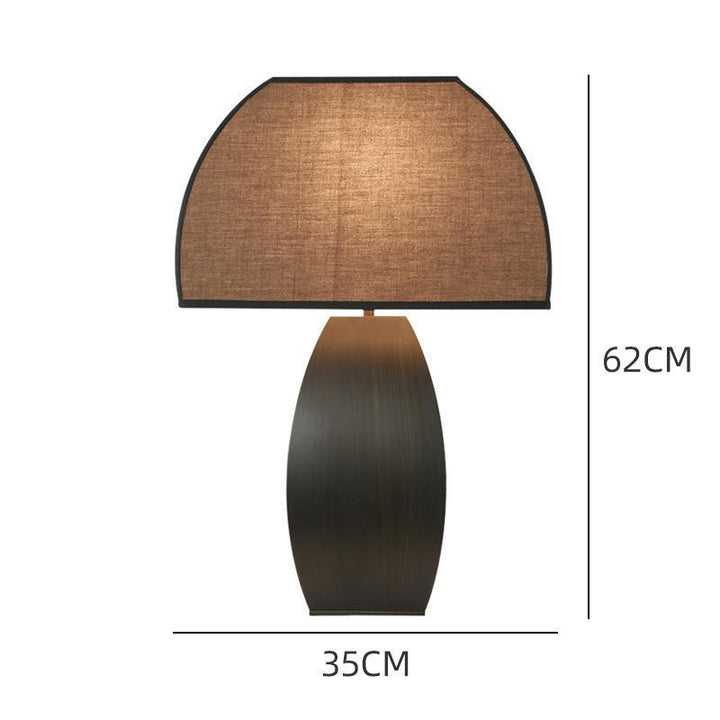 Dekorative Tischlampe mit texturiertem Schirm