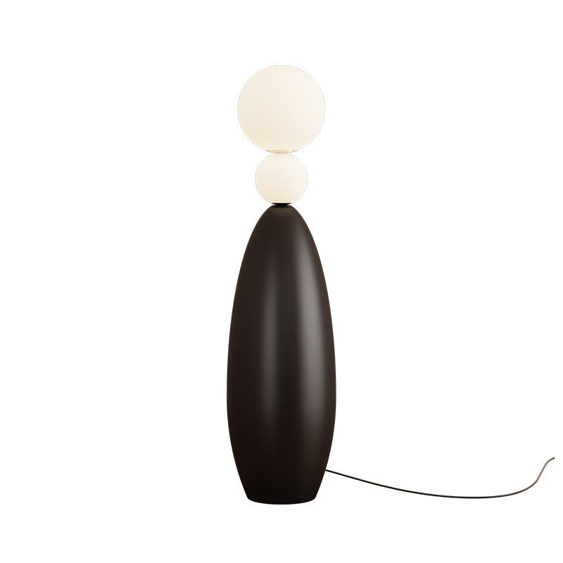 Skulptural Stehlampe mit dualem Globusdesign
