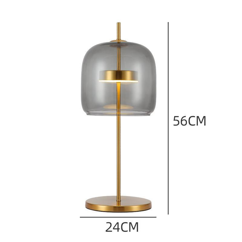 Moderne Tischlampe aus Glas mit goldenen Akzenten