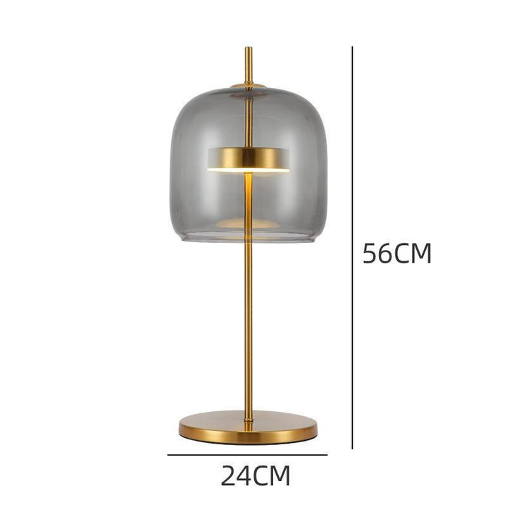 Moderne Tischlampe aus Glas mit goldenen Akzenten