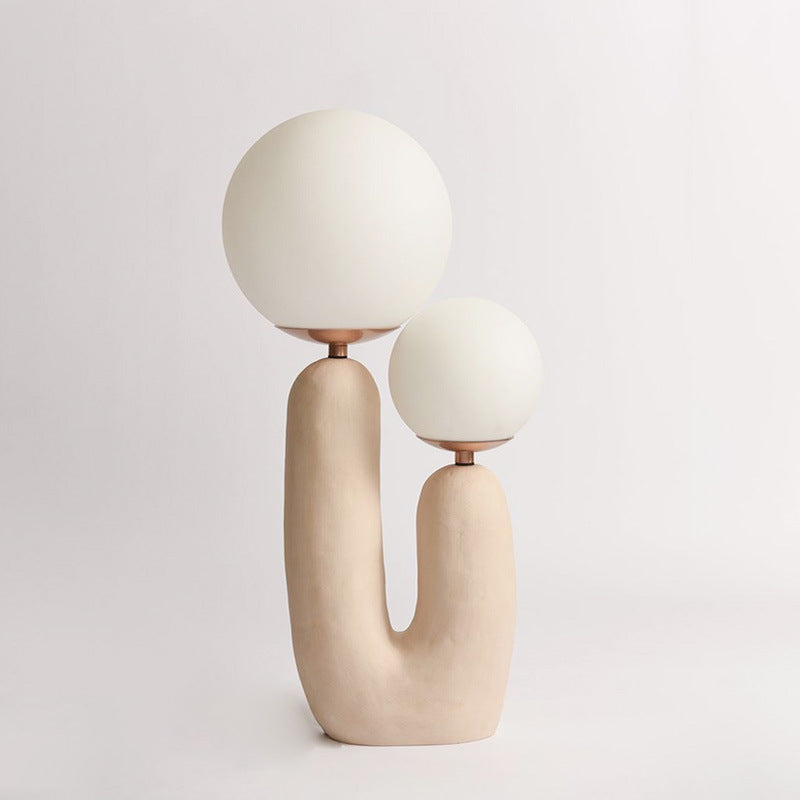 Künstlerische Tischlampe mit dualem Globusdesign