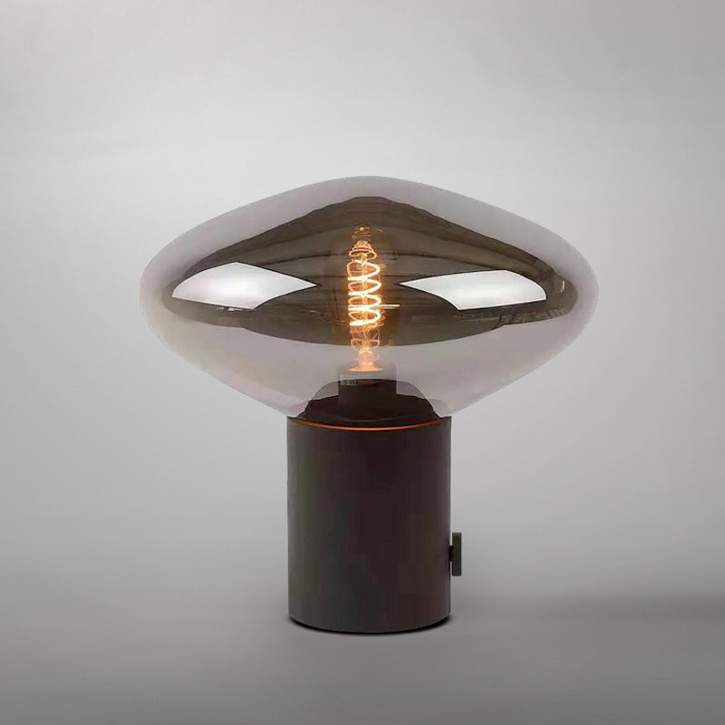 Kunstvolle Tischlampe mit einzigartigem Glasschirm