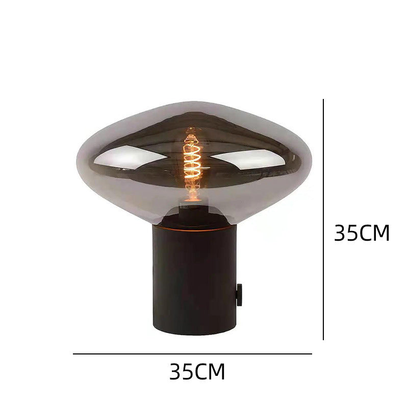Kunstvolle Tischlampe mit einzigartigem Glasschirm