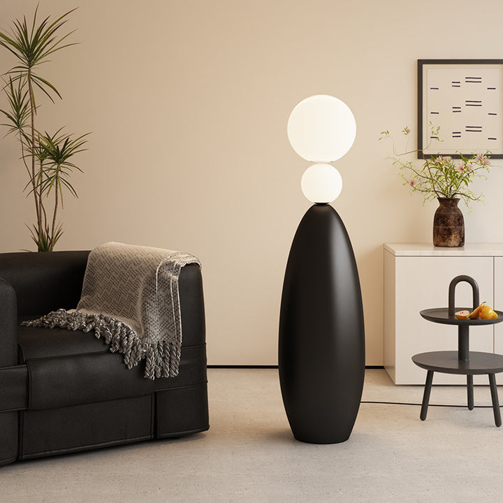 Skulptural Stehlampe mit dualem Globusdesign