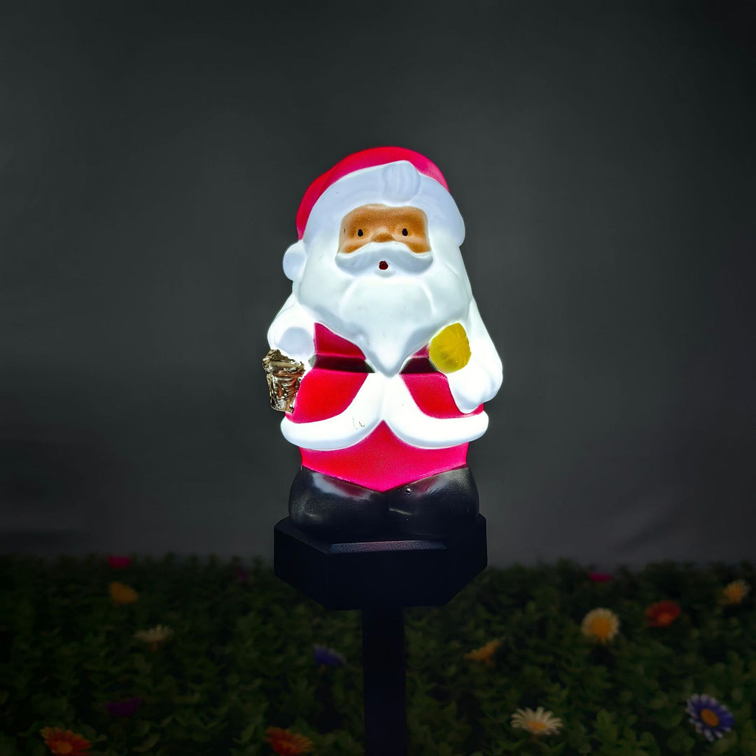 Weihnachtlich dekorierte Gartenbeleuchtung Figurine