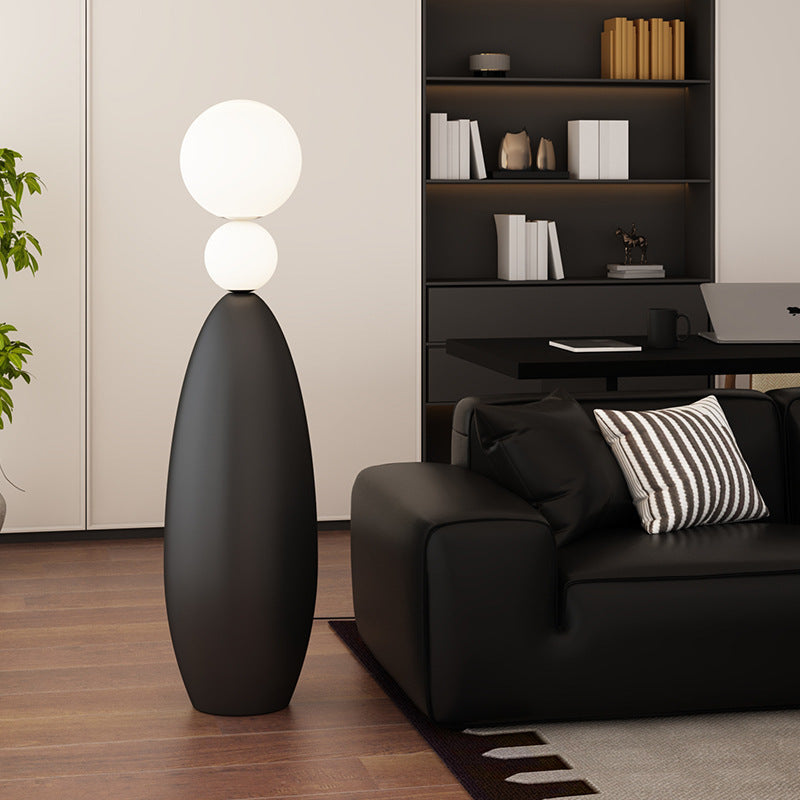 Skulptural Stehlampe mit dualem Globusdesign