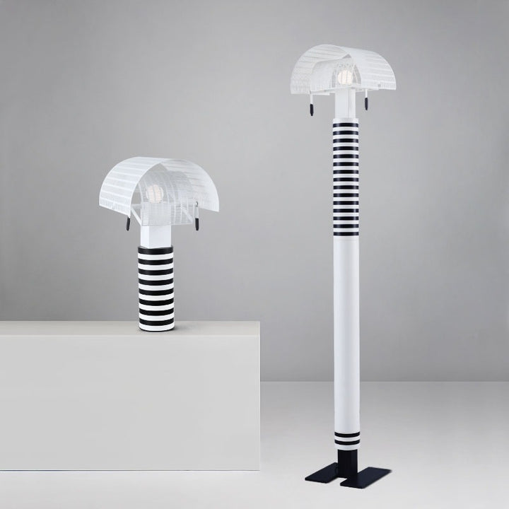 Moderne dekorative Tischlampe mit gestreiftem Sockel