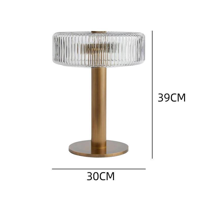 Elegante gerippte Glas- und Gold-Tischlampe