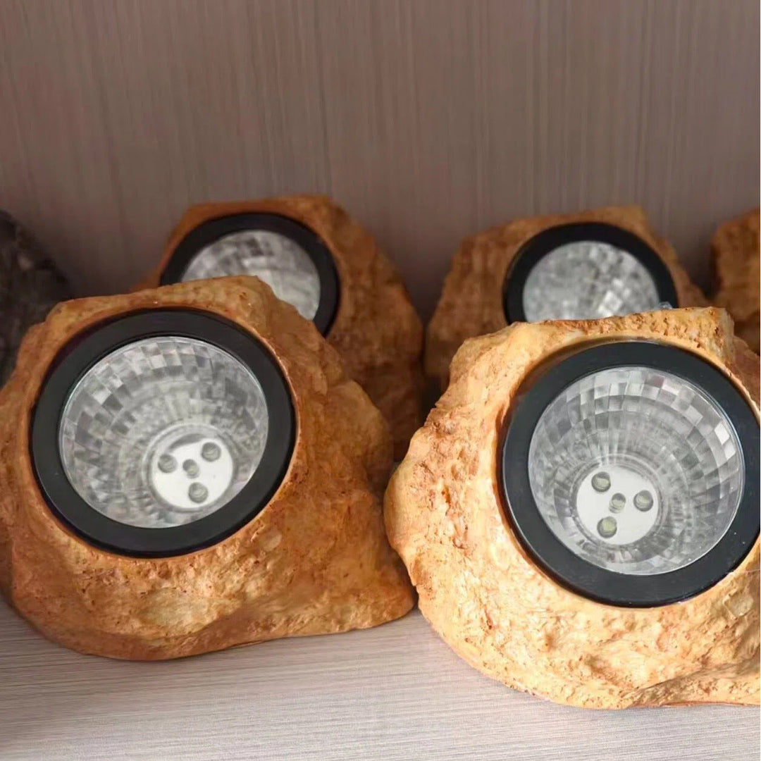 Solarbetriebene LED-Faux-Stein-Gartenstrahler mit integriertem Solarpanel und wetterfestem strukturiertem Harzgehäuse