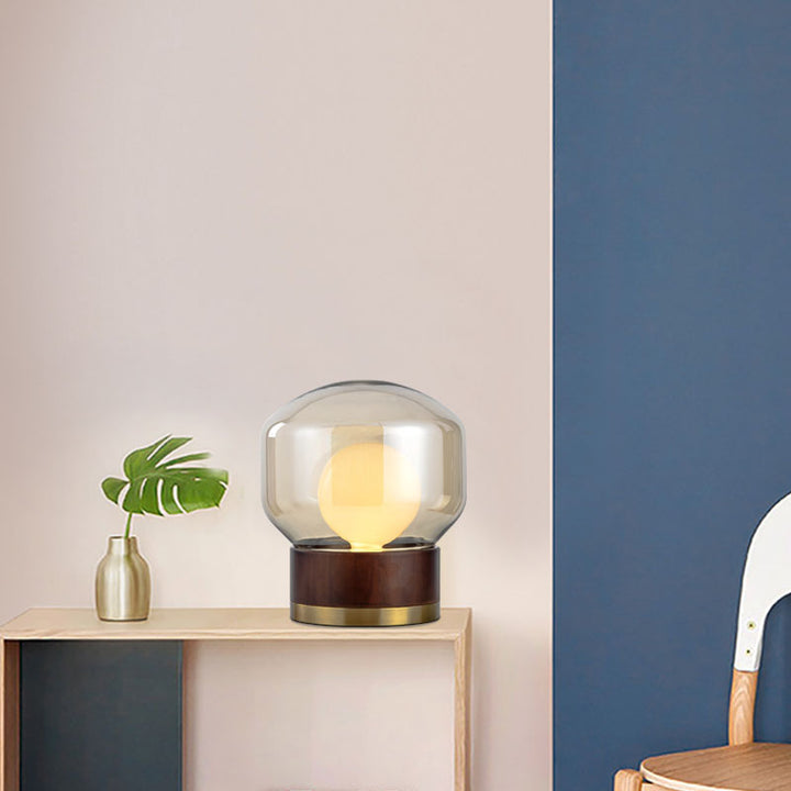 Moderne Glas Tischlampe mit Holzfuß und Goldakzenten