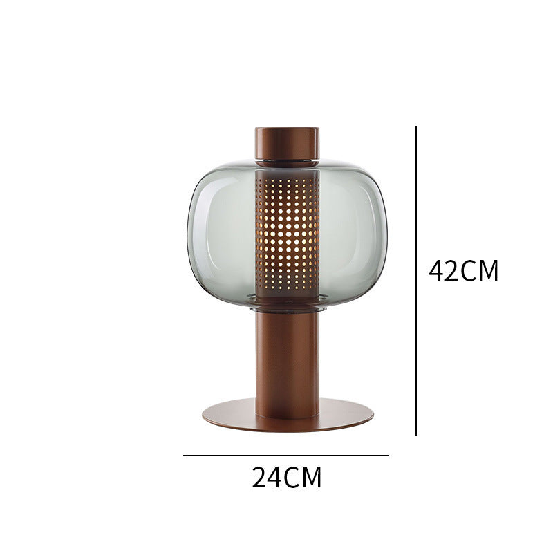 Künstlerische Tischlampe mit elegantem Glasschirm