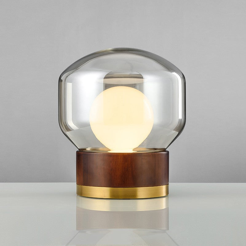 Moderne Glas Tischlampe mit Holzfuß und Goldakzenten