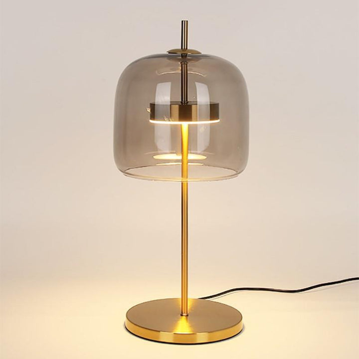 Moderne Tischlampe aus Glas mit goldenen Akzenten