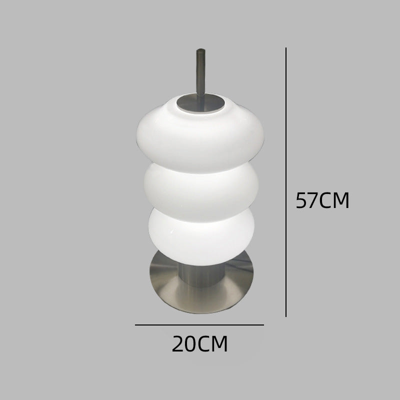 Skulptural Stehlampe mit geschwungenem Design