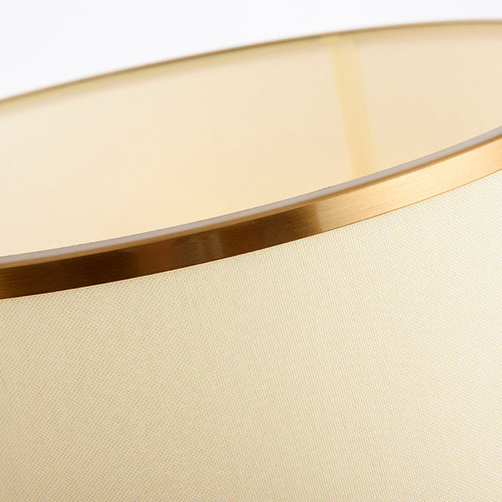 Elegante moderne Tischlampe mit skulpturalem goldenen Sockel