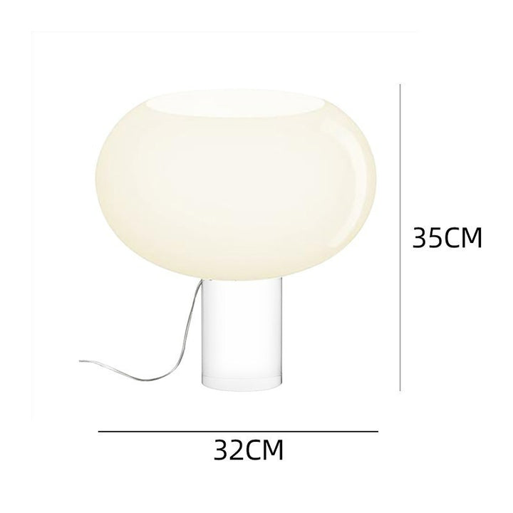 Moderne Tischlampe mit elegantem Globus-Schirm