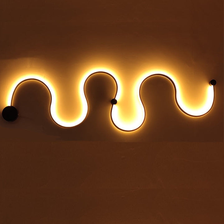 Skulpturale LED Wellenwandlampe