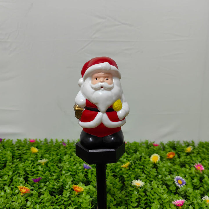 Weihnachtlich dekorierte Gartenbeleuchtung Figurine