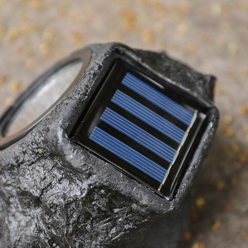 Solarbetriebene LED-Faux-Stein-Gartenstrahler mit integriertem Solarpanel und wetterfestem strukturiertem Harzgehäuse