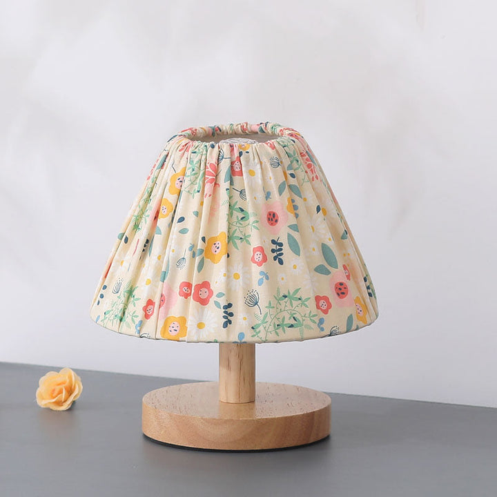 Moderner minimalistischer kreativer Eisenblumenform 1-Lampen Tischlampe